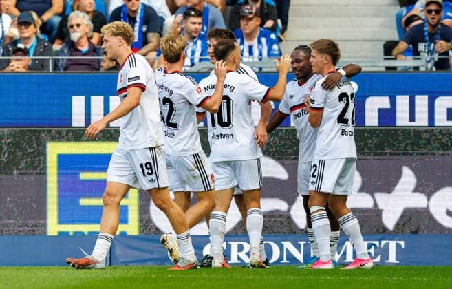 September 19, 2026 Soccer Season 2026–2027, Matchday 2, Bundesliga, Karlsruher SC (KSC) vs. 1. FC Nürnberg (FCN), Club Sports Photo by Zink DaMa xdaxmax. DFL regulations prohibit any use of photographs as image sequences and or quasi-video For editorial use only: celebration, joy, goal celebration after scoring the 0–1 goal by Mohamed Ali Zoma (23, 1), 1. FC Nürnberg (FCN), and the team celebrating; goal scorer Mohamed Ali Zoma (23, 1), 1. FC Nürnberg (FCN)