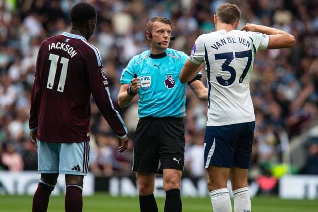 Micky van de Ven of Tottenham Hotspur and Nicolas Jackson of Aston Villa talk to referee Samuel Barrott about a VAR check Tottenham Hotspur v Aston Villa, Premier League, Football, Tottenham Hotspur Stadium, London, UK - 19 Sep 2026London Tottenham Hotspur Stadium United Kingdom EDITORIAL USE ONLY No use with unauthorised audio, video, data, fixture lists, club league logos or live services. Online in-match use limited to 120 images, no video emulation. No use in betting, games or single club league player publications. Copyright: xSeanxTroup Shutterstockx 17158343u