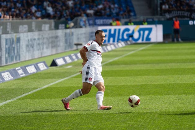 September 19, 2026, xjyhynx, Soccer 2. Bundesliga, Karlsruher SC vs. 1. FC Nürnberg, from left: pass by Julian Justvan 10, 1 FC Nürnberg DFL DFB REGULATIONS PROHIBIT ANY USE OF PHOTOGRAPHS AS IMAGE SEQUENCES AND OR QUASI-VIDEO Karlsruhe