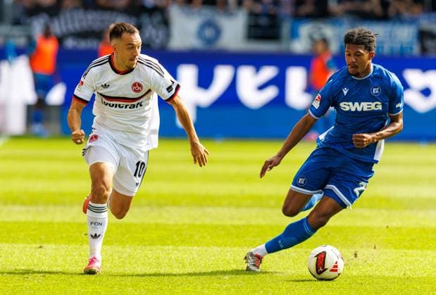 September 19, 2026 Soccer Season 2026–2027 Matchday 2 Bundesliga Karlsruher SC (KSC) vs. 1. FC Nürnberg (FCN) Club Sports Photo by Zink DaMa xdaxmax DFL regulations prohibit any use of photographs as image sequences and or quasi-video For editorial use only Julian Justvan 10, 1 FC Nürnberg (FCN) Sandro Tremoulet 24, Karlsruher SC (KSC)