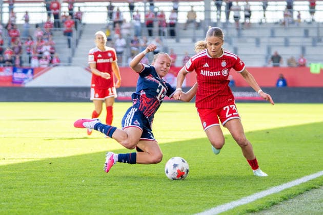 Beke Sterner, 37, of 1. FC Köln, and Sophie Proost, 23, of FC Bayern, in action during the Google Pixel Women s Bundesliga match between FC Bayern Munich and 1. FC Köln on September 19, 2026, at the FC Bayern Campus in Munich, Bavaria, Germany