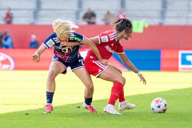 Carolin Elsen (20, Cologne) and Jovana Damnjanovic (9, Bayern) in action during the Google Pixel Women s Bundesliga match between FC Bayern Munich and 1. FC Köln on September 19, 2026, at the FC Bayern Campus in Munich, Bavaria, Germany