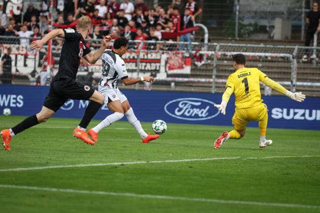 3rd Division, 2026–27 Season: Viktoria Köln vs. FC Ingolstadt 04; Nishan Velupillay (No. 28, FCI), Arne Schulz (No. 1, Viktoria Köln), Meiko Sponsel (No. 19, Viktoria Köln); Photo by Jürgen Meyer; 3rd Division, 2026–27 Season: Viktoria Köln vs. FC Ingolstadt 04