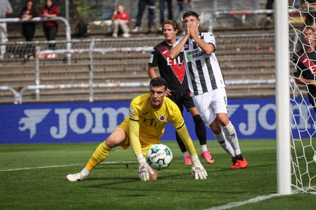3rd Division, 2026–27 Season: Viktoria Köln vs. FC Ingolstadt 04; Georgios Antzoulas (No. 6, FCI) and Arne Schulz (No. 1, Viktoria Köln); Photo by Jürgen Meyer; 3rd Division, 2026–27 Season: Viktoria Köln vs. FC Ingolstadt 04