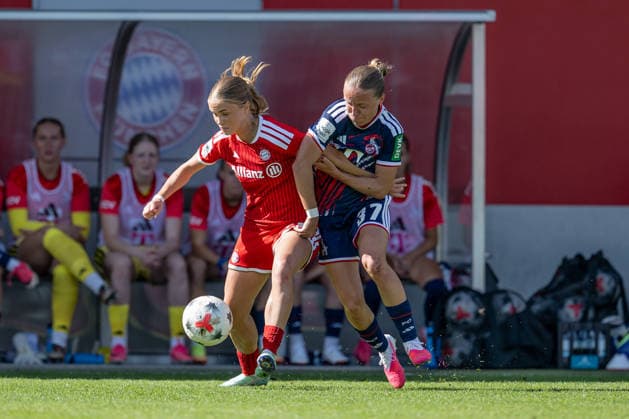 Battle for the Ball: Tackle between Sophie Proost of FC Bayern Munich Women, No. 23, and Beke Sterner of 1. FC Köln, No. 37 (GER), FC Bayern Munich Women vs. 1. FC Cologne, soccer, Google Pixel Women’s Bundesliga, Matchday 5, 2026–2027 season, September 19, 2026 DFL DFB regulations prohibit any use of photographs as image sequences and or quasi-video. Photo: HMB Media, Heike Feiner Copyright: HMBxMedia HeikexFeiner