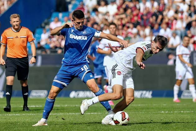 From left in a one-on-one situation: Marvin Wanitzek (SC Karlsruhe, 10), Adam Markhiyev (FC Nuremberg, 6, GER), SC Karlsruhe vs. FC Nuremberg Soccer, Matchday 6, 2026–2027 Season, 2. Bundesliga, September 19, 2026. DFL and DFB regulations prohibit any use of photographs as image sequences and or quasi-video. GER SC Karlsruhe vs. FC Nuremberg Soccer Matchday 6 Season 2026–2027 September 19, 2026 Copyright: xEibner-Pressefoto JoergxHirschx EP_JHH