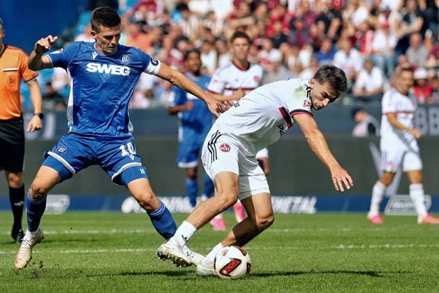 From left in a one-on-one situation: Marvin Wanitzek (SC Karlsruhe, 10), Adam Markhiyev (FC Nuremberg, 6, GER), SC Karlsruhe vs. FC Nuremberg Soccer, Matchday 6, 2026–2027 Season, 2. Bundesliga, September 19, 2026. DFL and DFB regulations prohibit any use of photographs as image sequences and or quasi-video. GER SC Karlsruhe vs. FC Nuremberg Soccer Matchday 6 Season 2026–2027 September 19, 2026 Copyright: xEibner-Pressefoto JoergxHirschx EP_JHH
