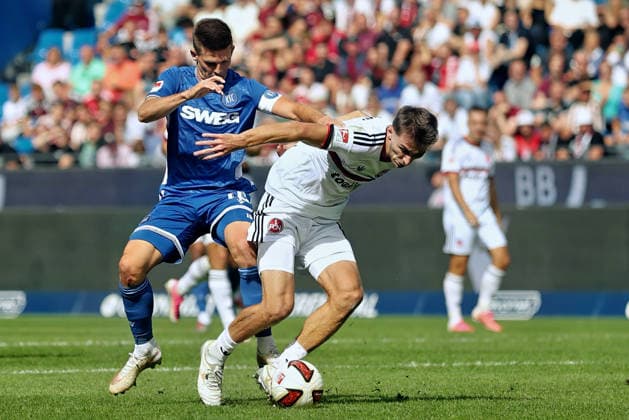 From left in a one-on-one situation: Marvin Wanitzek (SC Karlsruhe), 10; Adam Markhiyev (FC Nuremberg), 6 (GER), SC Karlsruhe vs. FC Nuremberg Soccer, Matchday 6, 2026–2027 Season, 2. Bundesliga, September 19, 2026. DFL and DFB regulations prohibit any use of photographs as image sequences and or quasi-video. GER SC Karlsruhe vs. FC Nuremberg Soccer Matchday 6, 2026–2027 Season, September 19, 2026 Copyright: xEibner-Pressefoto JoergxHirschx EP_JHH