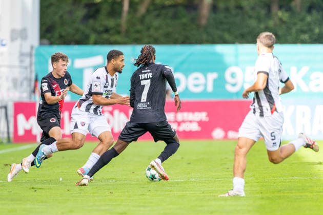 Lucas Wolf of Viktoria Köln, 21, in a tackle with Keanan Bennett of FC Ingolstadt 04, 18, and Yannick Tonye of Viktoria Köln, 07 FC Viktoria Köln vs. FC Ingolstadt 04, soccer, 3. Liga, Matchday 7, 2026–27 season, September 19, 2026, DFL regulations prohibit any use of photographs as image sequences and or quasi-video. FC Viktoria Köln vs. FC Ingolstadt 04, soccer, 3. Liga, Matchday 7, 2026–27 season, September 19, 2026, Cologne Copyright: xEibner-Pressefoto LukasxBaldygax EP_LBA