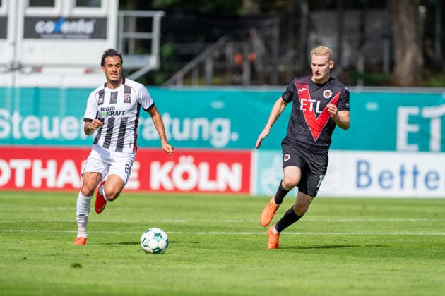 Nishan Velupillay (FC Ingolstadt 04), 28, in a footrace with Meiko Sponsel (Viktoria Köln), 19, for the ball; FC Viktoria Köln vs. FC Ingolstadt 04, soccer, 3. Liga, Matchday 7, 2026–27 season, September 19, 2026, DFL regulations prohibit any use of photographs as image sequences and or quasi-video, FC Viktoria Köln vs. FC Ingolstadt 04, soccer, 3. Liga, Matchday 7, 2026–27 season, September 19, 2026, Cologne Copyright: xEibner-Pressefoto LukasxBaldygax EP_LBA