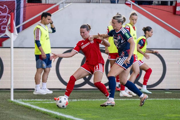 Battle for the ball: A tackle between Sarah Mattner Trembleau of FC Bayern Munich Women, No. 11, and Sandra Maria Jessen of 1. FC Cologne, No. 11, at the corner flag (GER), FC Bayern Munich Women vs. 1 FC Cologne, Soccer, Google Pixel Women’s Bundesliga, Matchday 5, 2026–2027 Season, September 19, 2026 DFL DFB regulations prohibit any use of photographs as image sequences and or quasi-video. Photo: HMB Media, Heike Feiner Copyright: HMBxMedia HeikexFeiner