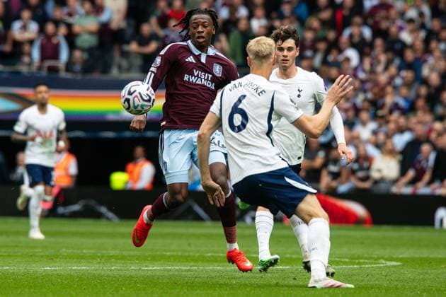 Johan Manzambi of Aston Villa watches the ball as he s closed down by Jan Paul van Hecke of Tottenham Hotspur Tottenham Hotspur v Aston Villa, Premier League, Football, Tottenham Hotspur Stadium, London, UK - 19 Sep 2026London Tottenham Hotspur Stadium United Kingdom EDITORIAL USE ONLY No use with unauthorised audio, video, data, fixture lists, club league logos or live services. Online in-match use limited to 120 images, no video emulation. No use in betting, games or single club league player publications. Copyright: xSeanxTroup Shutterstockx 17158343ab