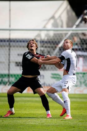 KOELN, GERMANY - SEPTEMBER 19, 2026: Tobias Eisenhuth (Viktoria Köln, 6) and Lars Lokotsch (FC Ingolstadt, 13) tackling during the 3rd division match on gameday 7 between Viktoria Koeln vs. FC Ingolstadt at the Sportpark Hoehenberg on September 19, 2026 in Koeln, Germany. DFL REGULATIONS PROHIBIT ANY USE OF PHOTOGRAPHS AS IMAGE SEQUENCES AND OR QUASI-VIDEO. Nordrhein-Westfalen Germany Copyright: xAxelxKohringx
