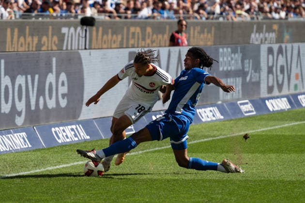 September 19, 2026, xjyhynx, Soccer 2. Bundesliga, Karlsruher SC vs. 1. FC Nürnberg, from left: Rafael Lubach 18, 1 FC Nürnberg in a tackle with Sandro Tromoulet 24, Karlsruher SC DFL DFB REGULATIONS PROHIBIT ANY USE OF PHOTOGRAPHS AS IMAGE SEQUENCES AND OR QUASI-VIDEO Karlsruhe