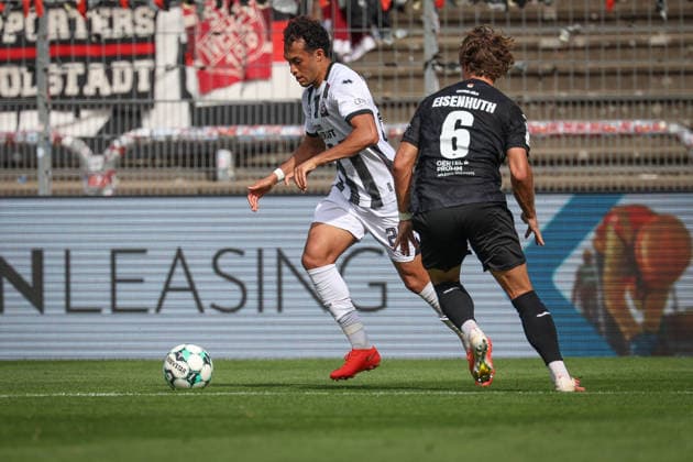 3rd Division, 2026–27 Season: Viktoria Köln vs. FC Ingolstadt 04; Nishan Velupillay (No. 28, FCI) and Tobias Eisenhut (No. 6, Viktoria Köln); Photo by Jürgen Meyer; 3rd Division, 2026–27 Season: Viktoria Köln vs. FC Ingolstadt 04