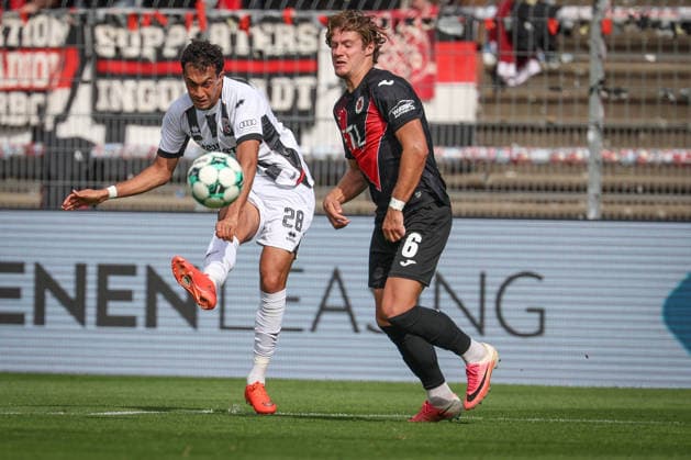 3rd Division, 2026–27 Season: Viktoria Köln vs. FC Ingolstadt 04; Nishan Velupillay (No. 28, FCI) and Tobias Eisenhut (No. 6, Viktoria Köln); Photo by Jürgen Meyer; 3rd Division, 2026–27 Season: Viktoria Köln vs. FC Ingolstadt 04