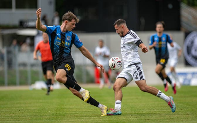 Soccer, 2026–2027 Season, Regionalliga West, September 19, 2026, Matchday 9, Men s, 1 FC Bocholt (white) vs. SC Wiedenbrücke (black); from left: Joschka Kroll (SC Wiedenbrücke), Marvin Lorch (1 FC Bocholt); Bocholt Stadion am Huenting, Germany 260919_fb_1fc-bocholt_sc-wiedenbrueck_58991