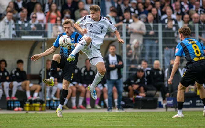 Soccer, 2026–2027 Season, Regionalliga West, September 19, 2026, Matchday 9, Men s, 1 FC Bocholt (White) vs. SC Wiedenbrück (Black), Sebastian Mai (SC Wiedenbrück), Gianluca Swajkowski (1 FC Bocholt), Bocholt Stadion am Huenting, Germany 260919_fb_1fc-bocholt_sc-wiedenbrueck_59002