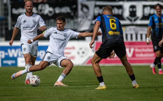 Soccer, 2026–2027 Season, Regionalliga West, September 19, 2026, Matchday 9, Men s, 1 FC Bocholt (white) vs. SC Wiedenbrueck (black); from left: Filip Ilic (1 FC Bocholt), Marius Zentler (SC Wiedenbrueck); Bocholt Stadion am Huenting, Germany 260919_fb_1fc-bocholt_sc-wiedenbrueck_59006