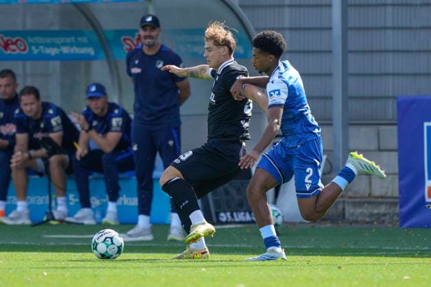 September 19, 2026, Dietmar Hopp Stadium, Hoffenheim, GER, 3. Liga, Matchday 7: TSG 1899 Hoffenheim II vs. SV Meppen, Florian Bähr (SV Meppen, 39) vs. Natnael Abraha (Hoffenheim II, 2). DFL regulations prohibit any use of photographs as image sequences and or quasi-video. Hoffenheim, Baden-Württemberg, Dietmar Hopp Stadium