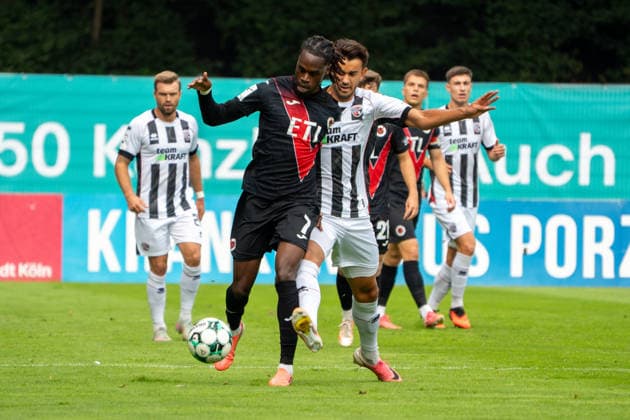 German Soccer, 3rd Division, 2026–27, Matchday 7, September 19, 2026: FC Viktoria Cologne vs. FC Ingolstadt 04 at Sportpark Höhenberg, Cologne. Joel Agyekum of FC Viktoria Cologne (No. 3) in a tackle with Fredrik Carlsen of FC Ingolstadt 04 (No. 8). Cologne, Germany Copyright: xMijoxLubecx
