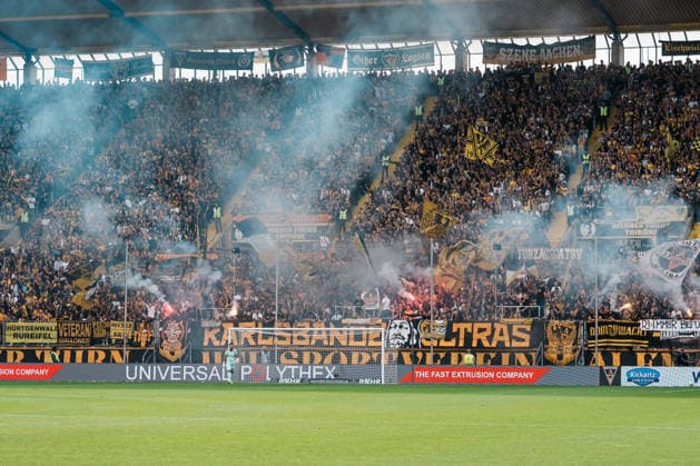 Germany Soccer 3rd Division 2026–2027, Matchday 7: Alemannia Aachen vs. Fortuna Düsseldorf at Tivoli Aachen; Pyrotechnics in the Werner Fuchs Stand after the 1–0 goal; Cheering, Goal, Joy, Celebrating, Fun, Emotions Copyright: xThiemoxRudolphx