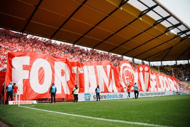 German Soccer 3rd Division 2026–2027, Matchday 7: Alemannia Aachen vs. Fortuna Düsseldorf at Tivoli Aachen; pre-game flag display, away section, Fortuna fans Copyright: xThiemoxRudolphx