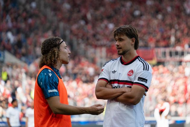 September 19, 2026, xjyhynx, Soccer 2. Bundesliga, Karlsruher SC vs. 1. FC Nürnberg, from left: Tim Civeja (23), Karlsruher SC talks with Fynn Otto (20) after the game, 1 FC Nürnberg DFL DFB REGULATIONS PROHIBIT ANY USE OF PHOTOGRAPHS AS IMAGE SEQUENCES AND OR QUASI-VIDEO Karlsruhe