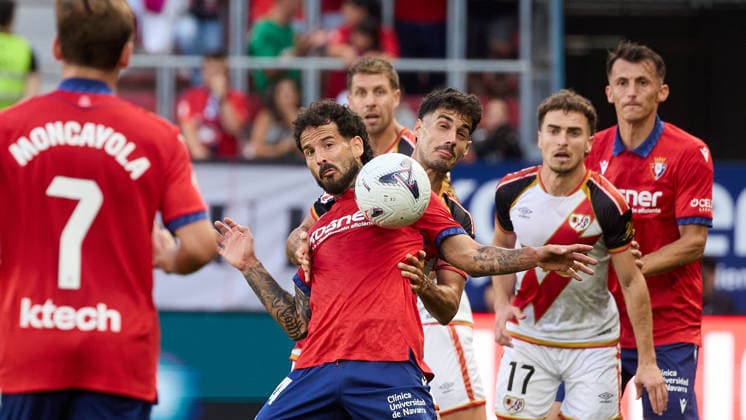 LaLiga EA Sports 2026–27: CA Osasuna vs. Rayo Vallecano—Rubén García (14, OSA L) and Óscar Valentín (23, RAY R) battle for the ball during the LaLiga EA Sports soccer match between CA Osasuna and Rayo Vallecano, played at El Sadar Stadium in Pamplona, Spain, on September 19, 2026. Florian Lejeune 24 RAY L, Adria Pedrosa 17 RAY, and Ante Budimir 17 OSA R are also visible in the image. Credit: Inigo Alzugaray, Agencia LOF, Pamplona. LaLiga EA Sports 2026–27: CA Osasuna vs. Rayo Vallecano Copyright: xINIGOxALZUGARAYx
