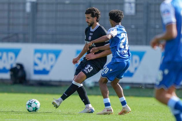 September 19, 2026, Dietmar Hopp Stadium, Hoffenheim, GER, 3rd Division, Matchday 7: TSG 1899 Hoffenheim II vs. SV Meppen, Stefan Rankic (SV Meppen 33) vs. Tiago Poller (Hoffenheim II 20). DFL regulations prohibit any use of photographs as image sequences and or quasi-video. Hoffenheim, Baden-Württemberg, Dietmar Hopp Stadium