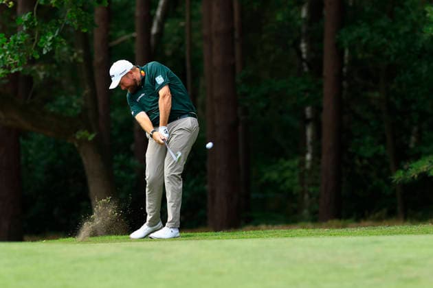 RECORD DATE NOT STATED 19th September 2026; Wentworth Golf Club, Virginia Water, Surrey, England; DP World Tour Golf, BMW PGA, Golf Herren Championship, Day 4; Shane Lowry putting all his effort into producing a big hook with his approach around the trees on the 13th hole ChrisxRoll