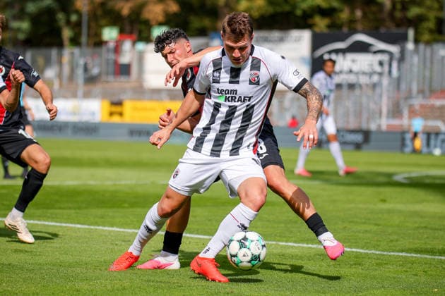 September 19, 2026, xsefx, Soccer, FC Viktoria Köln vs. FC Ingolstadt 04, 3. Liga, Sportpark Höhenberg, Matchday 7, 2026–2027 season: Onas Scholz (FC Ingolstadt 04) in a tackle against Taylan Duman (FC Viktoria Köln 08). DFB regulations prohibit any use of photographs as image sequences and or quasi-video. North Rhine-Westphalia, Germany