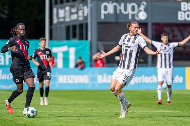 Yannick Tonye (Viktoria Köln), 07 in possession of the ball; Vinko Sapina (FC Ingolstadt 04), 41 protesting a foul against him; FC Viktoria Köln vs. FC Ingolstadt 04, soccer, 3rd Division, Matchday 7, 2026–27 season, September 19, 2026, DFL regulations prohibit any use of photographs as image sequences and or quasi-video. FC Viktoria Köln vs. FC Ingolstadt 04, soccer, 3rd Division, Matchday 7, 2026–27 season, September 19, 2026, Cologne Copyright: xEibner-Pressefoto LukasxBaldygax EP_LBA