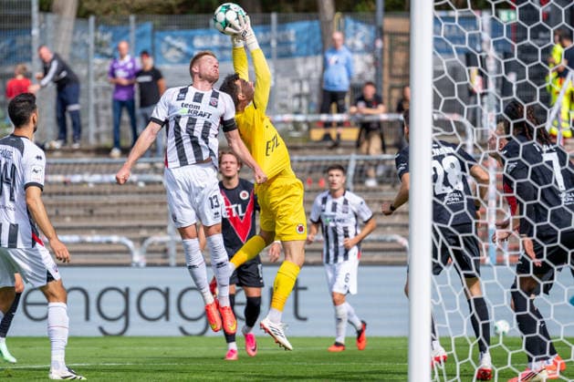 Lukas Froede (FC Ingolstadt 04, 34, 13) jumps to head the cross; Arne Schulz (Viktoria Köln, 01) intercepts the ball; Pascal Fallmann (Viktoria Köln, 28) and Yannick Tonye (Viktoria Köln), 07, FC Viktoria Köln vs. FC Ingolstadt 04, soccer, 3rd Division, Matchday 7, 2026–27 season, September 19, 2026, DFL regulations prohibit any use of photographs as image sequences and or quasi-video; FC Viktoria Köln vs. FC Ingolstadt 04, soccer, 3rd Division, Matchday 7, 2026–27 season, September 19, 2026, Cologne Copyright: xEibner-Pressefoto LukasxBaldygax EP_LBA