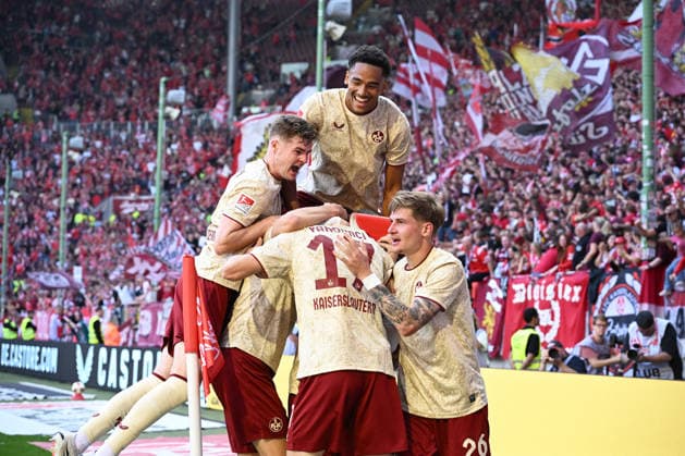 Soccer, 2. Bundesliga, 2026–27 Season, 1 FC Kaiserslautern, September 19, 2026, Fritz Walter Stadium, 1 FC Kaiserslautern (FCK) vs. Eintracht Braunschweig (BS), 1–0. Celebration after the 1–0 win. From left: Mario SAUER, 1 FC Kaiserslautern, goal scorer Erencan YARDIMCI, 1 FC Kaiserslautern, No. 17, Thierry TAZAMETA, 1 FC Kaiserslautern (top), and Paul JOLY, 1 FC Kaiserslautern, 1 FC Kaiserslautern