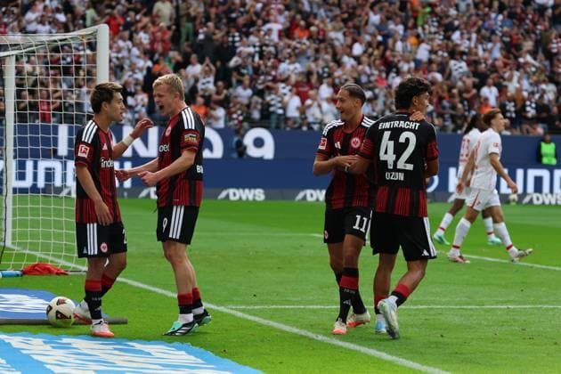 Goal celebration for the 1-0 goal by scorer Younes Ebnoutalib of Eintracht Frankfurt, No. 11, off an assist from Ritus Doan of Eintracht Frankfurt, No. 20; celebrating alongside him are Can Uzun of Eintracht Frankfurt, No. 42, and Jonathan Burkhardt, Jonathan Michael Jonny Burkardt, Jonny Burkardt (Eintracht Frankfurt, No. 9), Eintracht Frankfurt vs. SC Freiburg, Bundesliga, BL, 2026–2027 season, Match 4, September 19, 2026, Frankfurt, Deutsche Bank Park, Germany