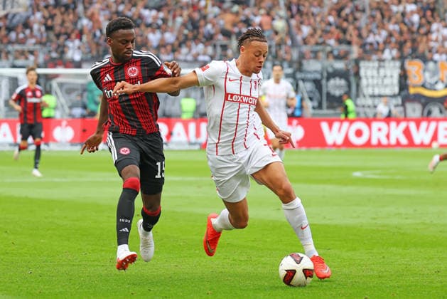 Frankfurt, Germany September 19, 2026 1. Bundesliga 2026–2027 Matchday 4 Eintracht Frankfurt vs. SC Freiburg Pictured from left: Noel Aseko (Frankfurt) in a tackle against Derry Scherhant (SCF) DFL and DFB regulations prohibit any use of photographs as image sequences and or quasi-video Deutsche Bank Park Hessen Copyright: xFotostandx xRacochax