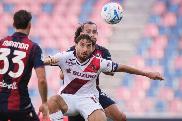 TorinoÕs Nikola Vlasic fights for the ball with BolognaÕs Arthur Theate during the Serie A soccer match between Bologna and Torino at the Renato DallÕAra Stadium in Bologna, north Italy - Saturday, September 19, 2026 -  Copyright: xMassimoxPaolone LaPressex