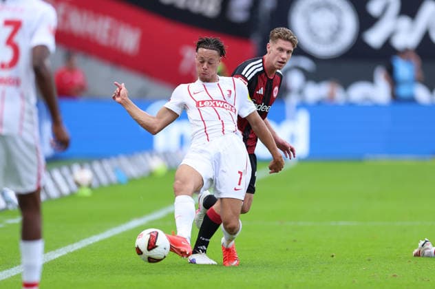 September 19, 2026, Bundesliga Soccer, Eintracht Frankfurt vs. SC Freiburg, from left, Derry Scherhant (SC Freiburg), Elias Baum (Eintracht Frankfurt). DFL and DFB regulations prohibit any use of photographs as image sequences and or quasi-video. xdcx Copyright: HMBxMedia Claus