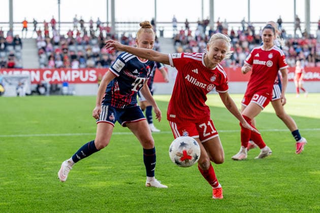 Battle for the Ball: Tackle between Laura Vogt (1. FC Köln, No. 08) and Pernille Harder (FC Bayern Munich Women, No. 21, GER), FC Bayern Munich Women vs. 1 FC Cologne, Soccer, Google Pixel Women’s Bundesliga, Matchday 5, 2026–2027 season, September 19, 2026 DFL DFB regulations prohibit any use of photographs as image sequences and or quasi-video. Photo: HMB Media, Heike Feiner Copyright: HMBxMedia HeikexFeiner