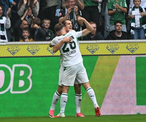 September 19, 2026, Mönchengladbach Soccer, Men s, 2026–2027 Season, Borussia Mönchengladbach vs. 1. FSV Mainz 05: Goal celebration by Gladbach scorer Florian Neuhaus, pictured here from behind with Gladbach s Lukas Ullrich after his goal to make it 1–0, 26. DFL regulations prohibit any use of photographs as image sequences and or quasi-video content. Borussia Park, North Rhine-Westphalia, Germany