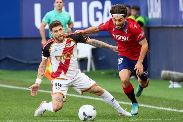 LaLiga EA Sports 2026–27 CA Osasuna vs. Rayo Vallecano Raúl Moro (18, OSA R) dribbles past Giorgi Tsitaishvili (14, RAY L) during the LaLiga EA Sports soccer match between CA Osasuna and Rayo Vallecano played at El Sadar Stadium in Pamplona, Spain, on September 19, 2026. Credit: Inigo Alzugaray, Agencia LOF, Pamplona. LaLiga EA Sports 2026–27: CA Osasuna vs. Rayo Vallecano Copyright: xINIGOxALZUGARAYx