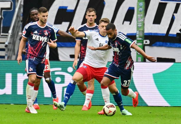 September 19, 2026, German Soccer, Men, 1st Division, Matchday 4, 2026–2027 Season, Hamburg, Hamburger SV vs. 1. FC Köln; Nicolai Remberg (HSV 21) tries to get past Linton Maina (Köln 37). DFB and DFL regulations prohibit any use of photographs as image sequences and or quasi-video. Hamburg Volksparkstadion, Hamburg, Germany Copyright: xnordphotoxGmbH xWitkex