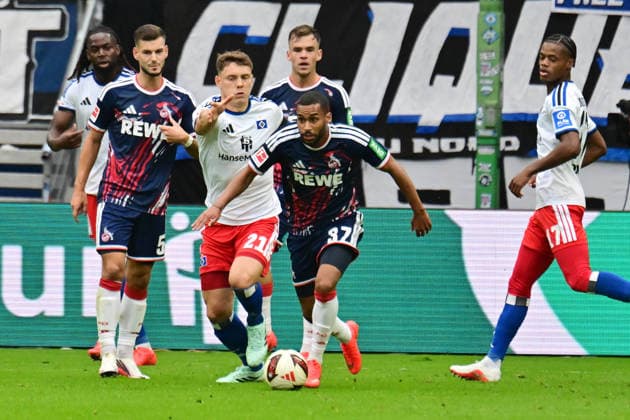 September 19, 2026, German Soccer, Men, 1st Division, Matchday 4, 2026–2027 Season, Hamburg, Hamburger SV vs. 1. FC Köln; Nicolai Remberg (HSV 21) tries to get past Linton Maina (Köln 37). DFB and DFL regulations prohibit any use of photographs as image sequences and or quasi-video. Hamburg Volksparkstadion, Hamburg, Germany Copyright: xnordphotoxGmbH xWitkex