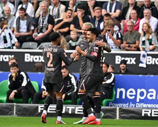 September 19, 2026, Mönchengladbach Soccer, Men s, 2026–2027 Season, Borussia Mönchengladbach vs. 1. FSV Mainz 05: Mainz celebrates after scoring the 1–1 goal; from left: Philipp Mwene (Mainz), goal scorer Phillip Tietz (Mainz), Nadiem Amiri (Mainz). DFL regulations prohibit any use of photographs as image sequences and or quasi-video content at Borussia Park, North Rhine-Westphalia, Germany