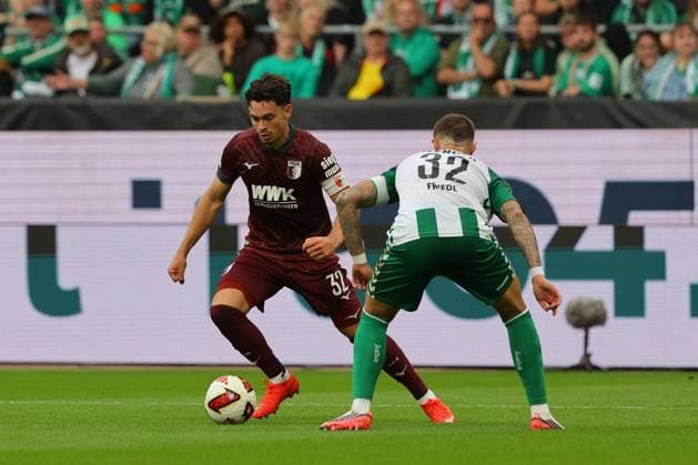 September 26, 19, GER, Soccer, 1st FBL Men, Matchday 4, 2026–2027 Season, SV Werder Bremen vs. FC Augsburg; Fabian Rieder (FC Augsburg, 32) in a tackle against Marco Friedl (SV Werder Bremen, 32); Bremen Weserstadion, Bremen, Germany Copyright: xnordphotoxGmbHx xTauchnitzx