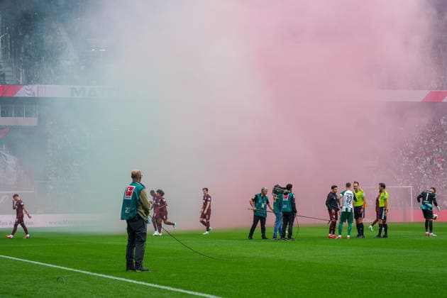 FC Augsburg fans setting off fireworks before kickoff, German soccer, Bundesliga, 2026–27 season, Matchday 4, September 19, 2026, Werder Bremen vs. FC Augsburg, Weserstadion, Bremen Copyright: xLeonxFrickx