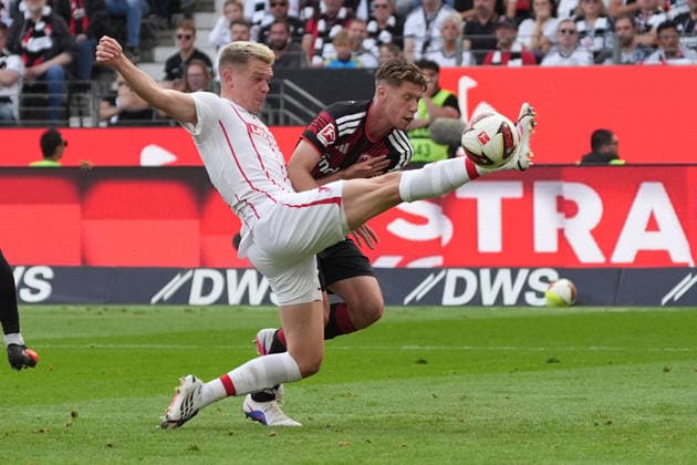 Matthias Ginter (SC Freiburg, 28) vs. Elias Baum (Eintracht Frankfurt) on September 19, 2026, Bundesliga, Season 26-27: Eintracht Frankfurt vs. SC Freiburg, Deutsche Bank Park, Matchday 4