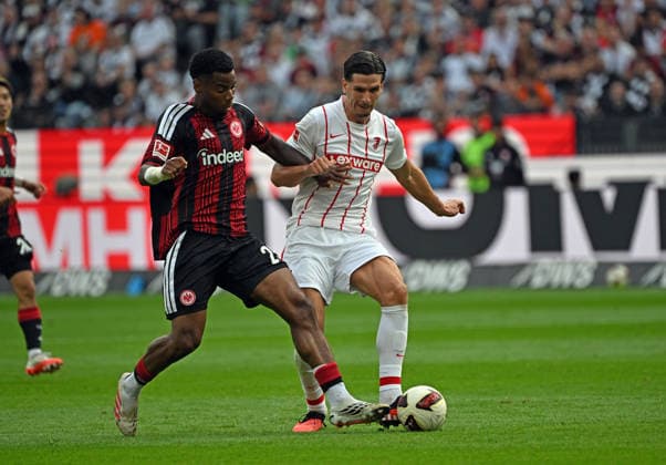 September 19, 2026, xjhx, Soccer, Bundesliga 1, Eintracht Frankfurt vs. SC Freiburg, Raphael Onyedika (Eintracht Frankfurt), Igor Matanovic (SC Freiburg). DFL and DFB regulations prohibit any use of photographs as image sequences and or quasi-video. Frankfurt am Main
