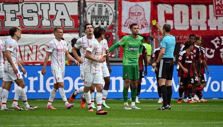 September 19, 2026, xjhx, Soccer, Bundesliga 1, Eintracht Frankfurt vs. SC Freiburg – Yellow card for Mio Backhaus (SC Freiburg). DFL and DFB regulations prohibit any use of photographs as image sequences and or quasi-video. Frankfurt am Main
